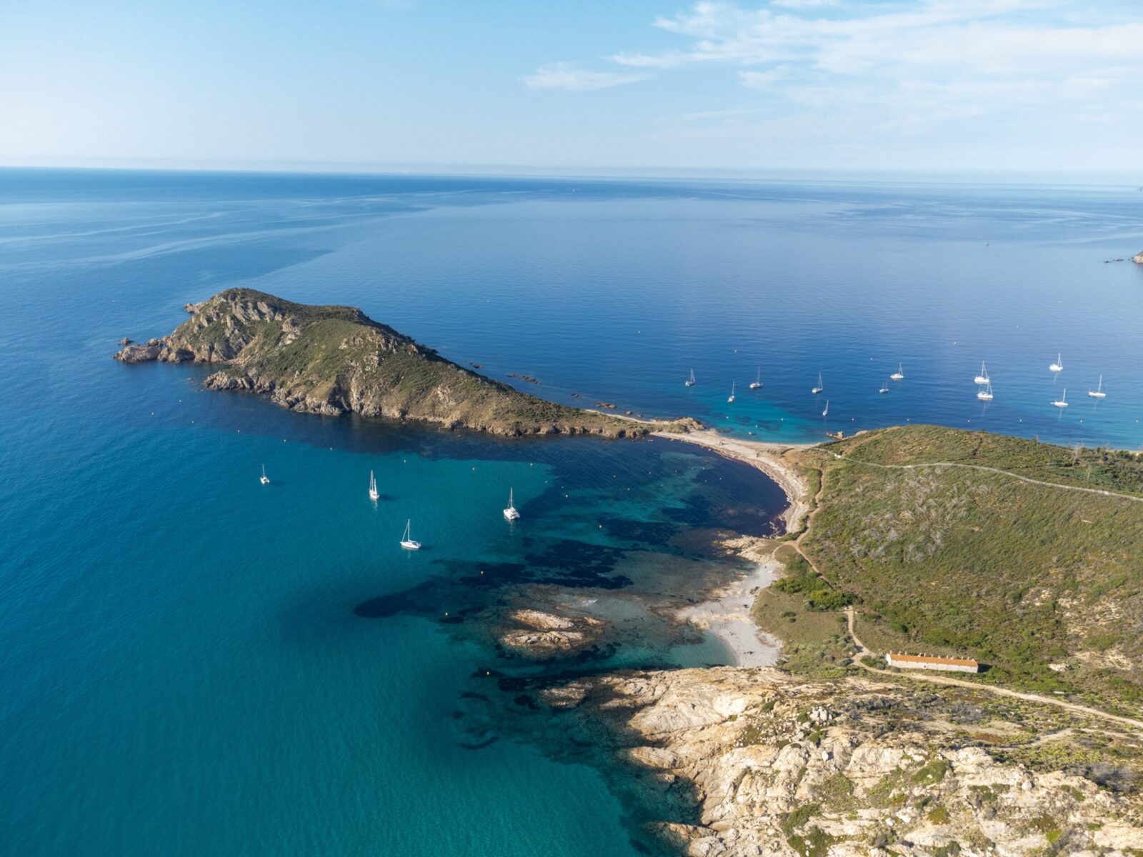 Aerial,View,Of,Cap,Taillat,Surrounded,By,The,Blue,Mediterranean