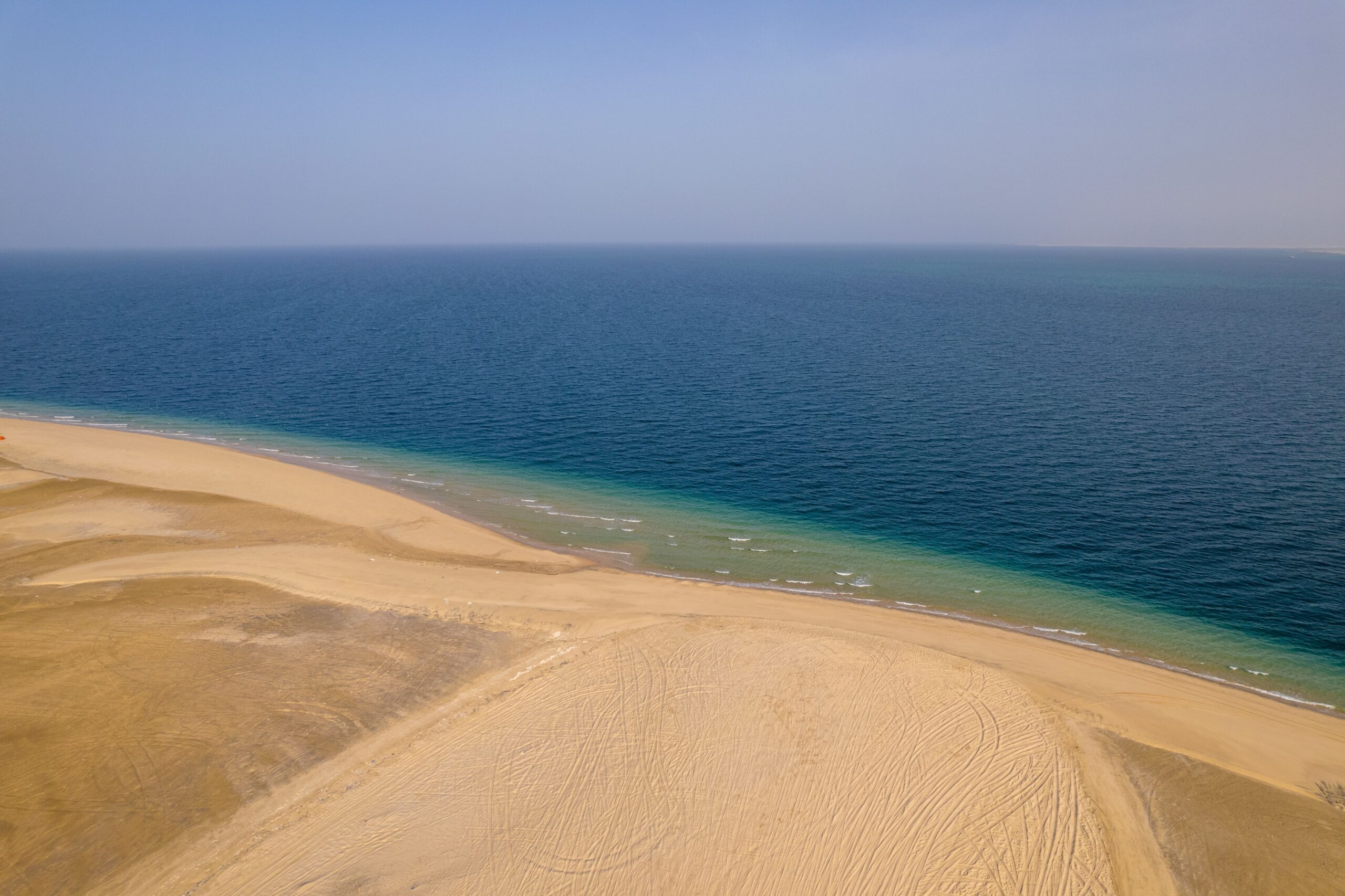 An,Aerial,View,Of,The,Sealine,Desert,And,Sand,Dunes