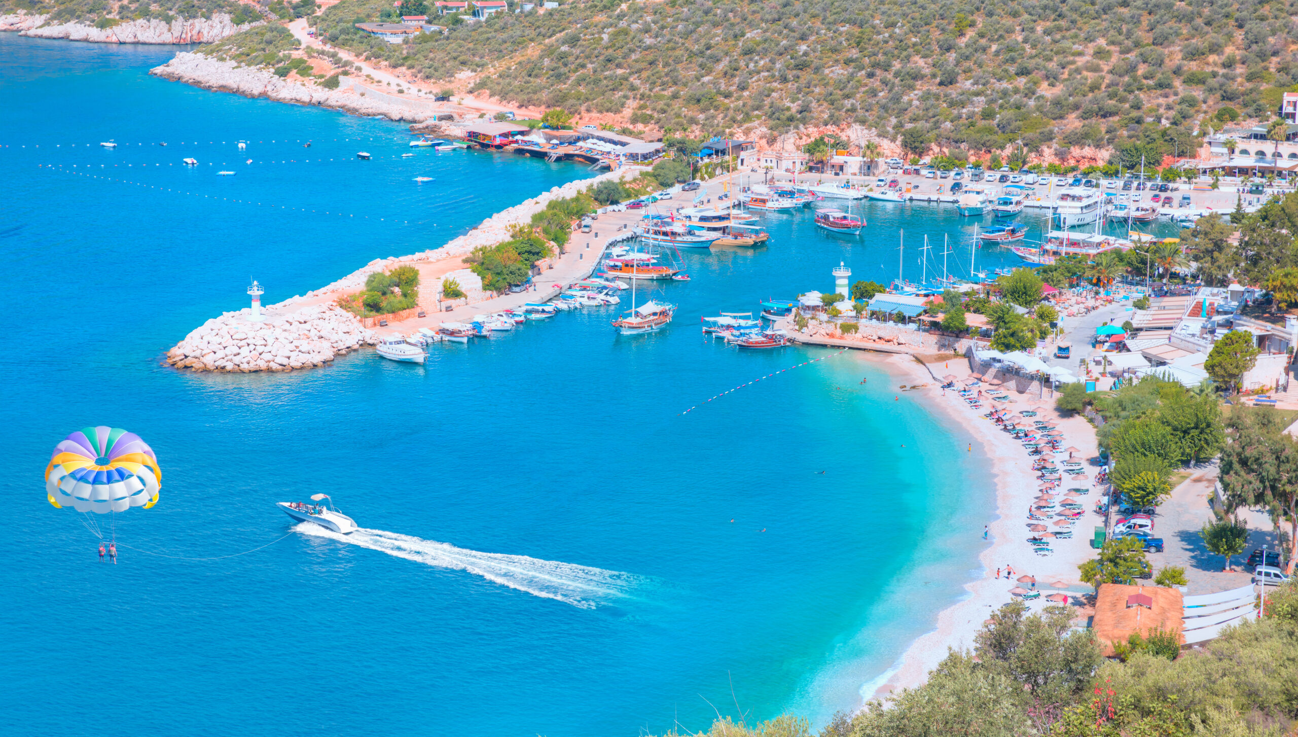 Holidaymakers,Sunbathing,At,Kalkan,Beach,-,Kalkan,,Turkey